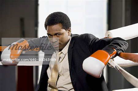 Businessman boxing