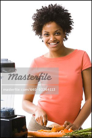 Woman preparing food in kitchen