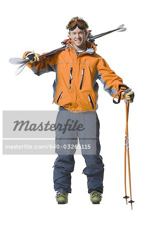 Male skier in orange ski jacket