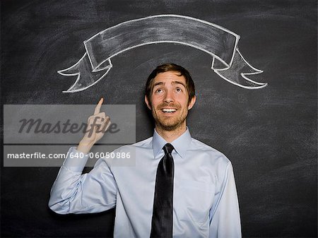 man against a blackboard