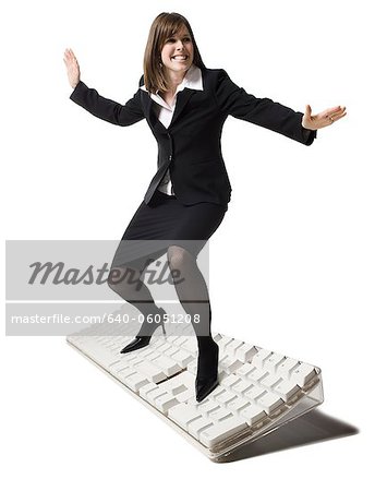 businessperson surfing on a keyboard