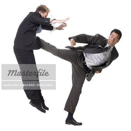 two businessmen fighting - Stock Photo - Masterfile - Premium