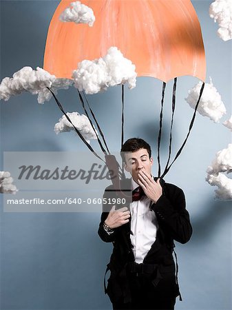 businessman parachuting