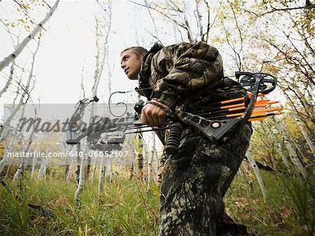 man hunting in the wilderness