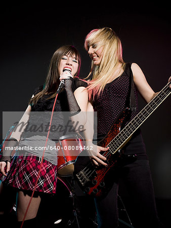 two girls in a rock band