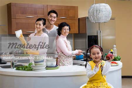 Family busying in kitchen