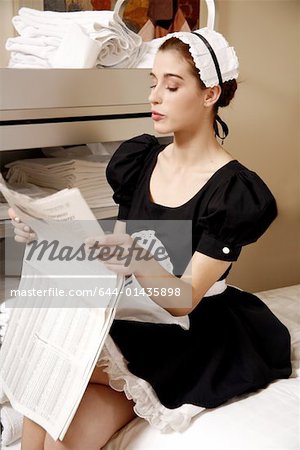 Hotel maid taking a break