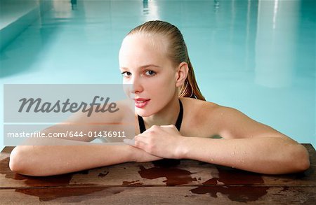 Young woman in a swimming pool at a spa