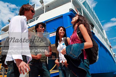 Young people at ferry dock