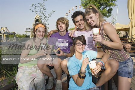 Teenagers hanging out, eating