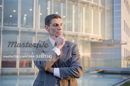 Businessman outside of office building