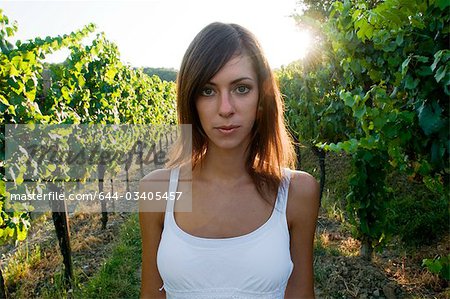 Young woman in vineyard