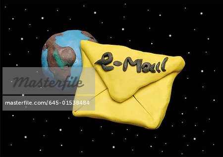 Email envelope traveling in night sky