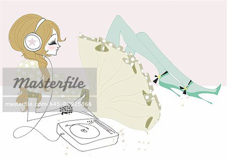 Young woman with headphones and record player