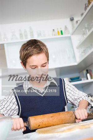 Boy preparing dough