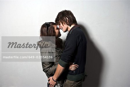 Young couple embracing low view