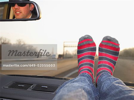 Feet on dashboard