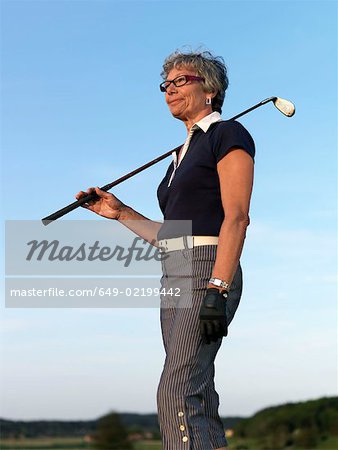 Woman with golf club
