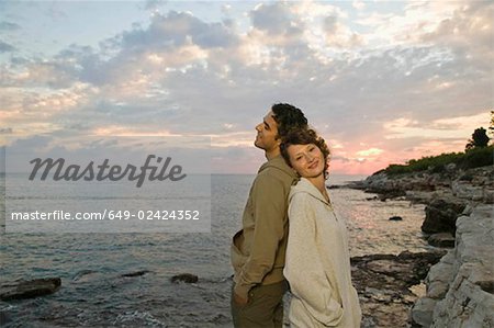 Couple and sunset over adriatic sea