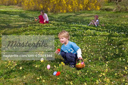 boy finding easter eggs