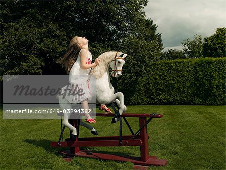 Rocking store horse girl