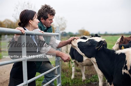 business woman talking to farmer