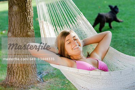 Girl and a dog in a garden