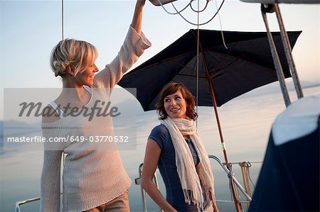 Girls standing on boat