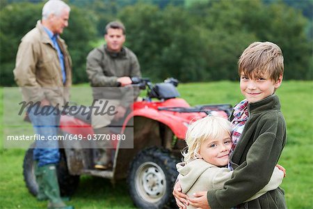 Family on quad bike