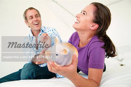 Couple fight over piggy bank