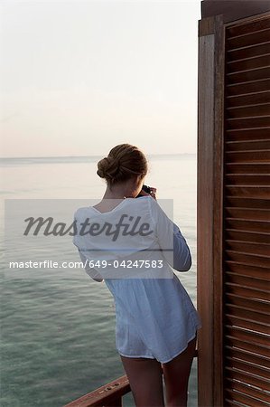 Woman standing on dock