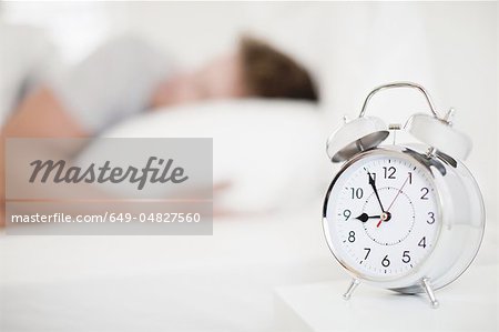 Close up of alarm clock on bedside table