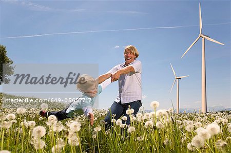 Father and son with wind turbines