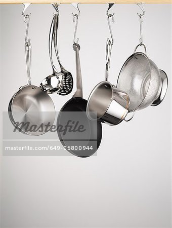 Pots and pans hanging from hooks