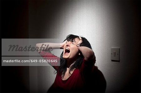 Woman shouting indoors