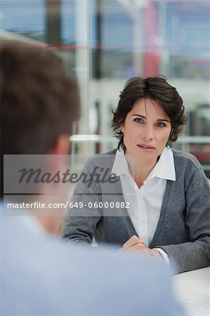 Business people talking in meeting