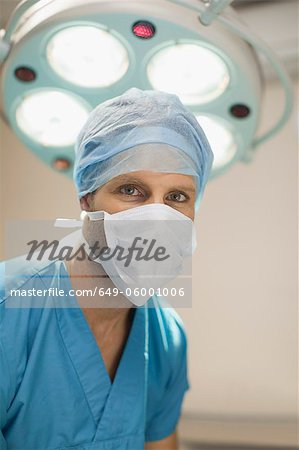 Veterinary surgeon wearing face mask