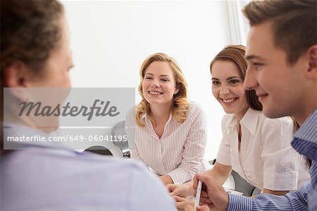 Business people talking in meeting