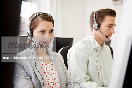 Business people working in headsets