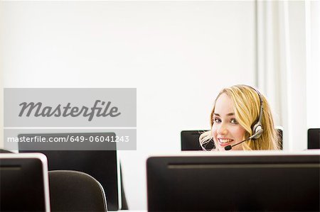 Businesswoman working in headset