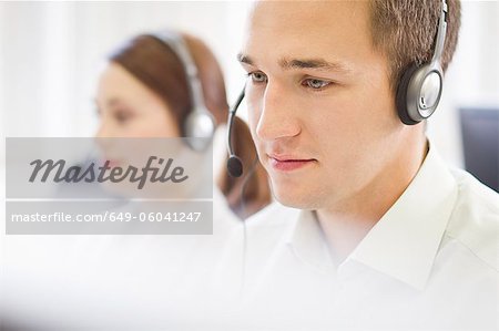 Business people working in headsets