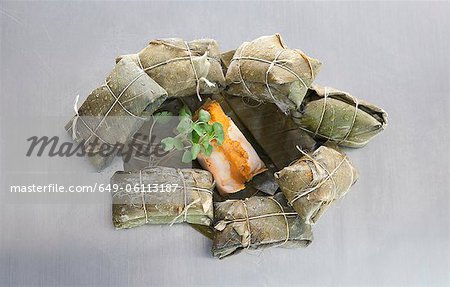 Tamales, wrapped in banana leaves