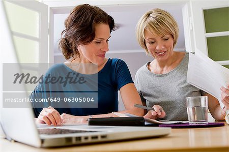 Women working together on laptop
