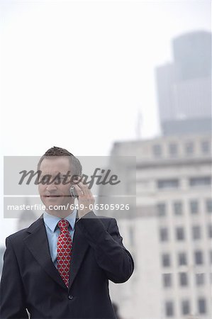 Businessman talking on cell phone