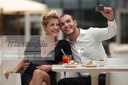 Couple taking picture of themselves