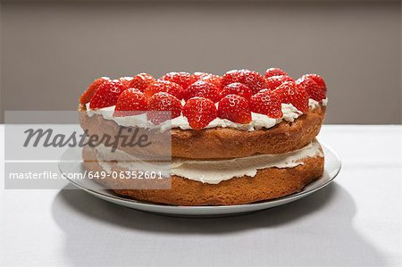 Layer cake with cream and strawberries Layer cake with cream and strawberries