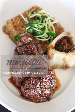 Plate of grilled beef with bone marrow Plate of grilled beef with bone marrow
