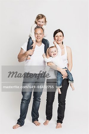 Smiling family posing together