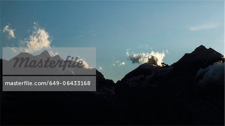 Silhouette of jagged mountain range
