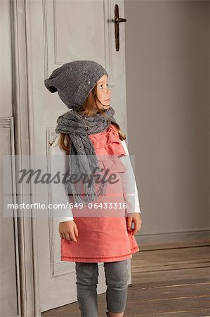 Smiling girl wearing hat and scarf